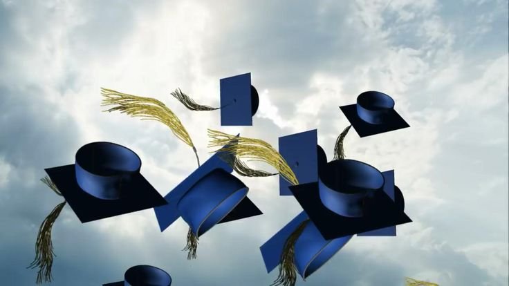 Graduation caps in the sky
